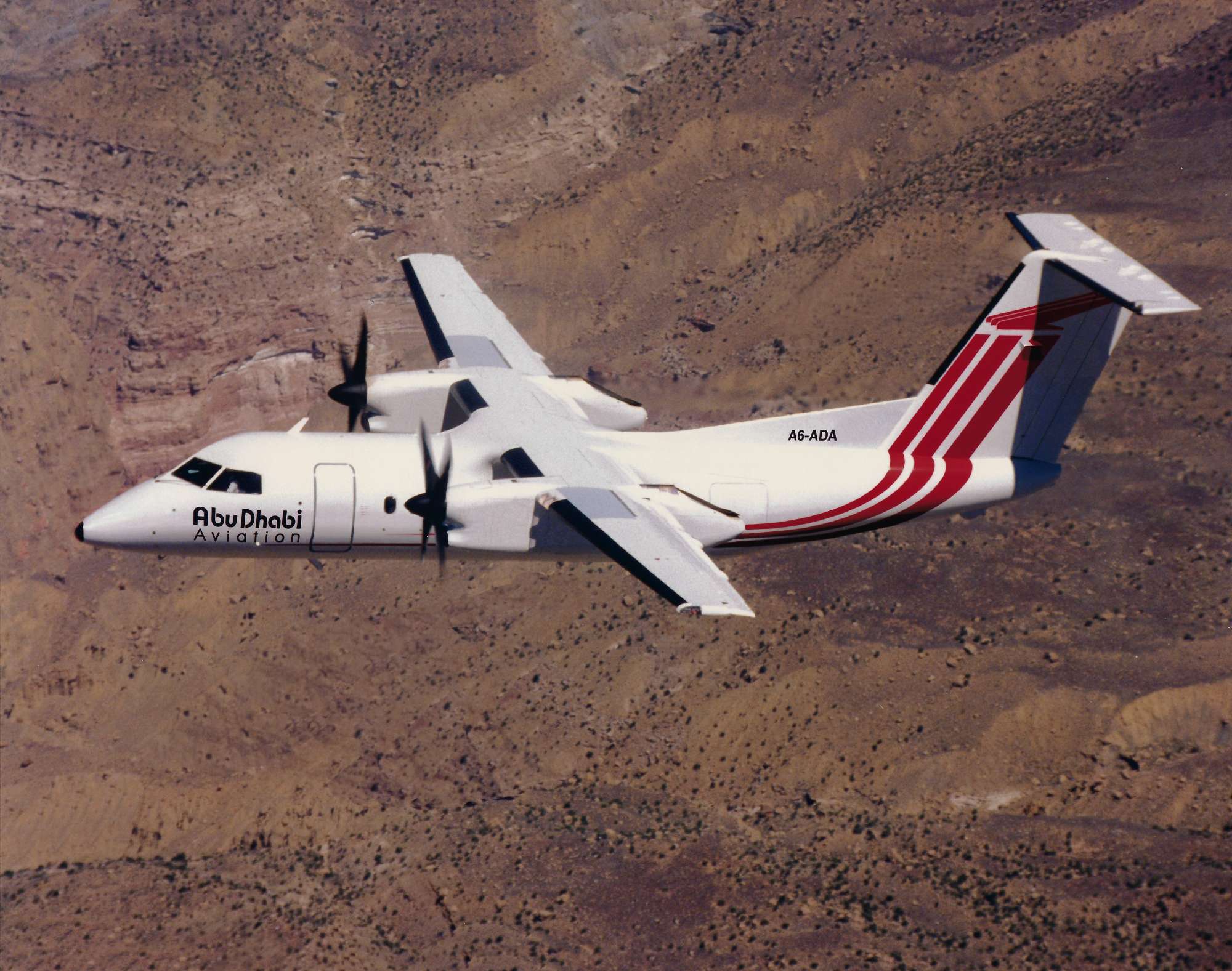 Bombardier Dash 8 series 200 of Abu Dhabi. Photo - Bombardier Aerospace low