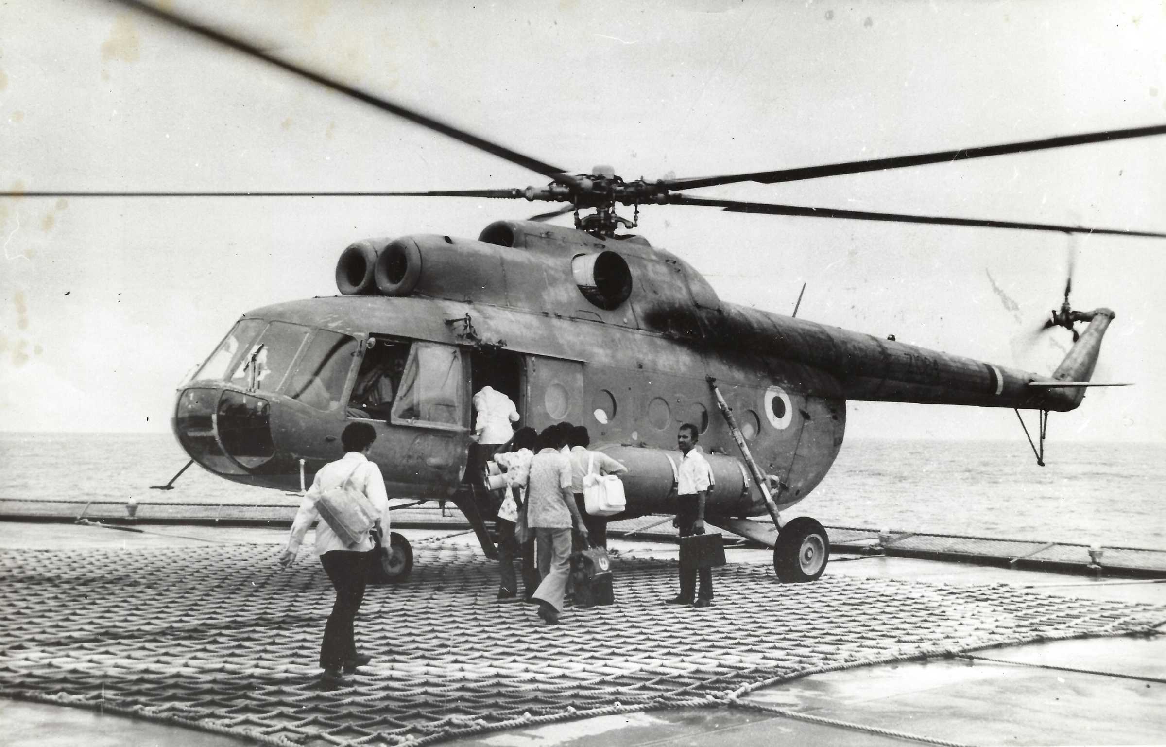 IAF helicopter ferring vital equipment and supplies at an off-shore oil rig LOW