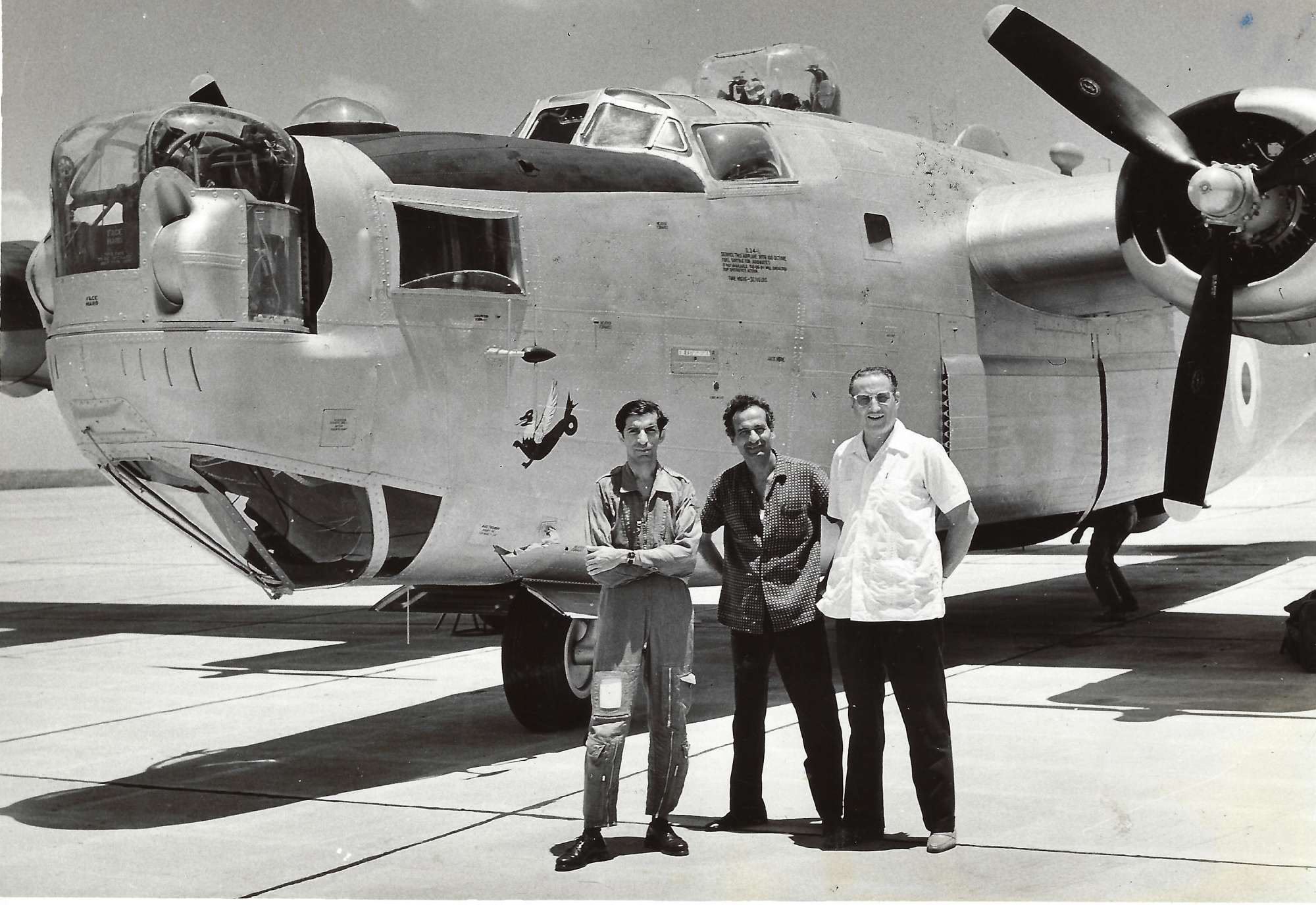 LOW (L2R) Wg. Cdr. I.M. Chopra, pilot, Flt. Officer P. Daruwalla, Flt. Eng. and Wg. Cdr. DW Conner (retd), RAF co-pilot and chief donor for HE-807 liberator aircraft