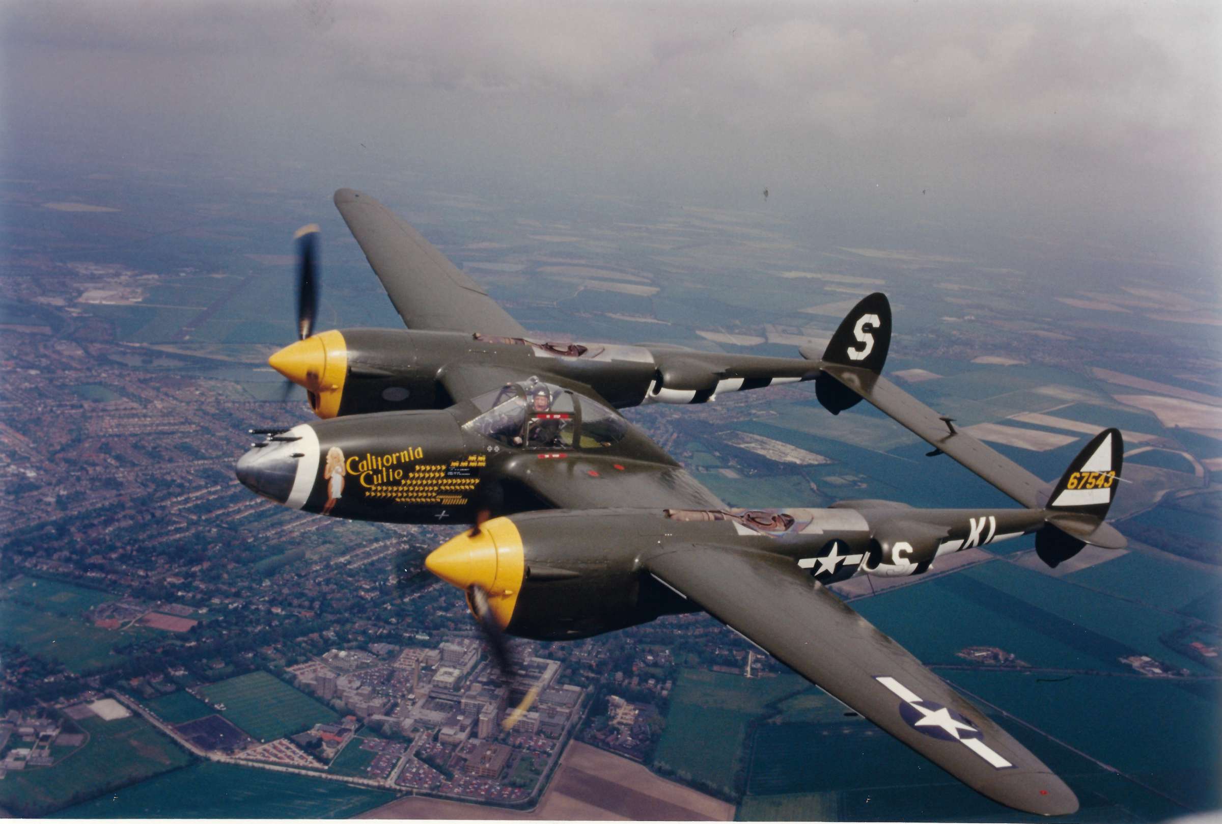Lockheed P-38J at Farnborough marked the fighters particiation in the Allies D-Day assault. Credit - Ernoult. The fighter collection low