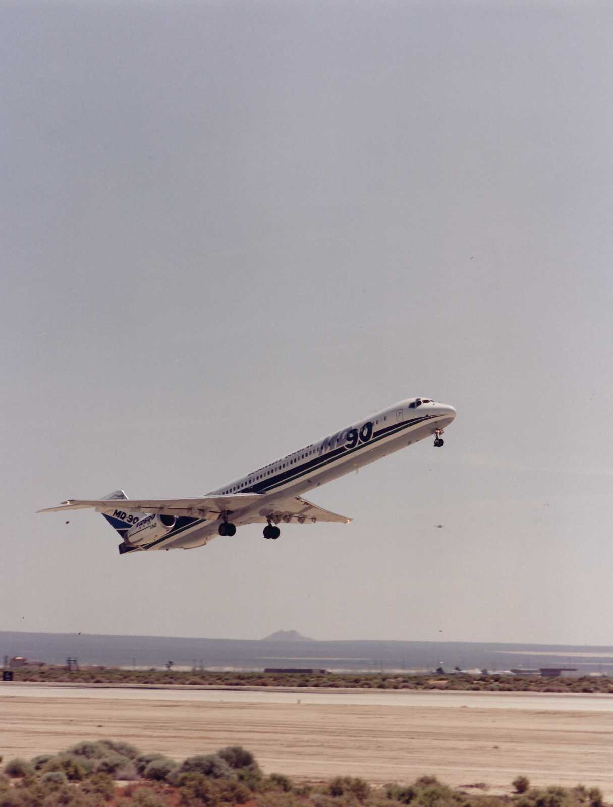 McDonnel Douglas DC-90 powered by its IAE V2500 engines lifts off. 1