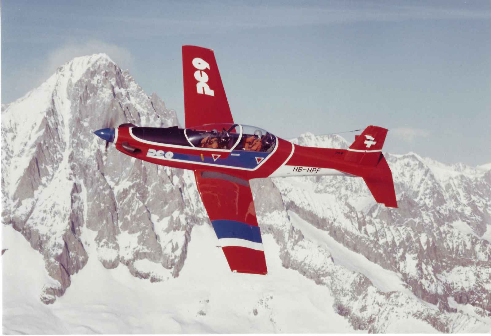 Pilatus PC9 advanced turboprop trainer SN 107 HB-HPF over the Swiss Alps. Photo - Pilatus 4